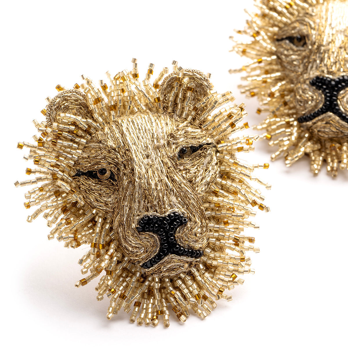 Detail of Deepa Gurnani handmade the Lion earrings in gold color