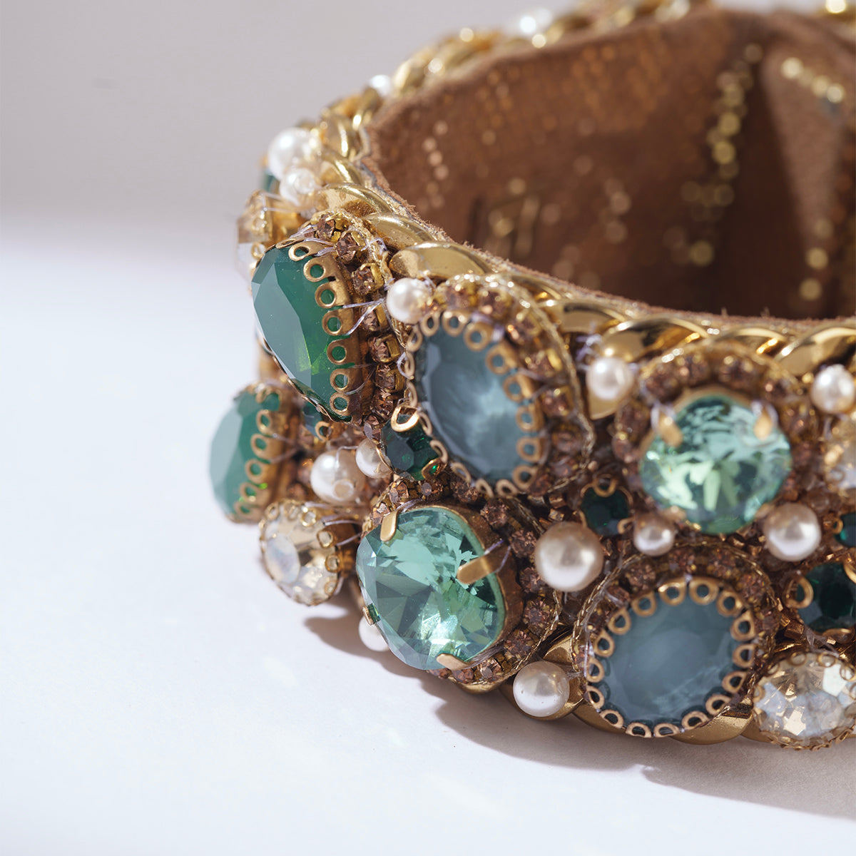 Detail of Deepa Gurnani Handmade Zevar bracelet in Emerald color