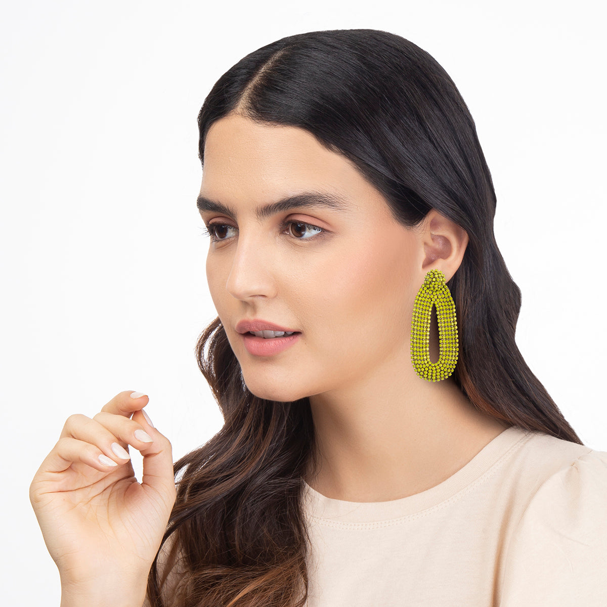 Our model wearing our light weight Bianca Earrings are handmade with glass crystals in an oval drop shape.