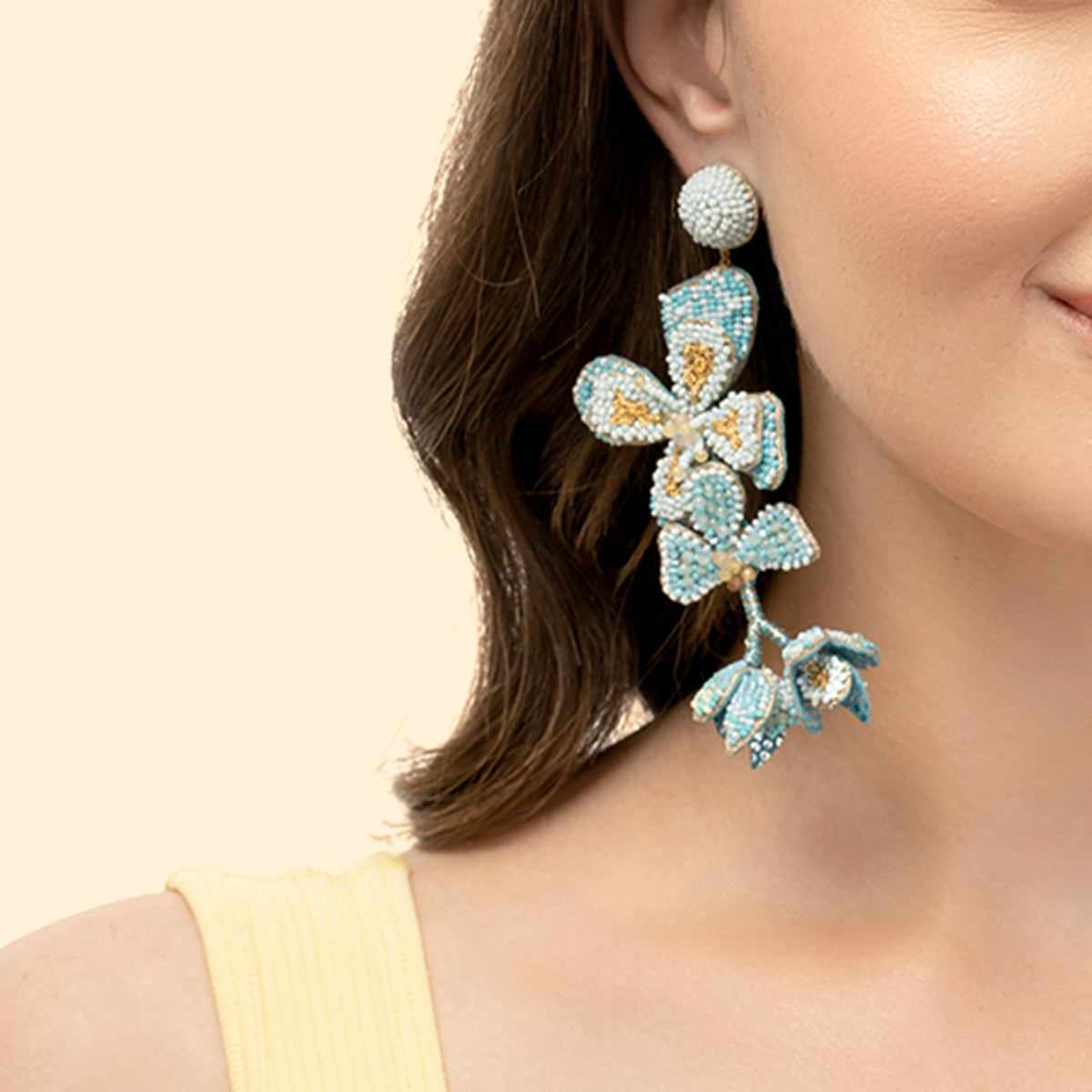 Model wearing handmade luxury Bluebell Earrings