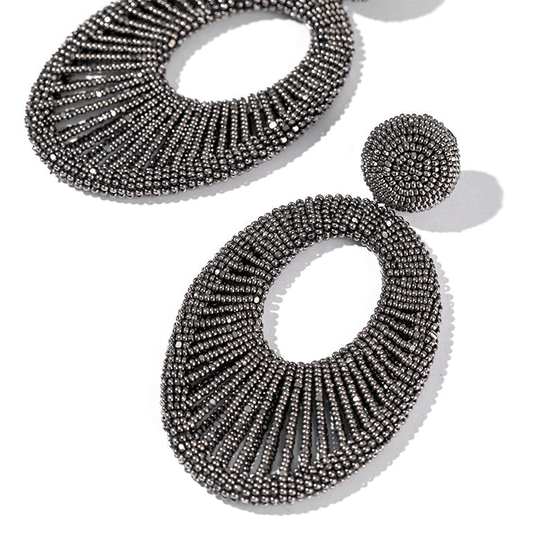 Detail of Deepa Gurnani Handmade Cypress Earrings in Gunmetal color