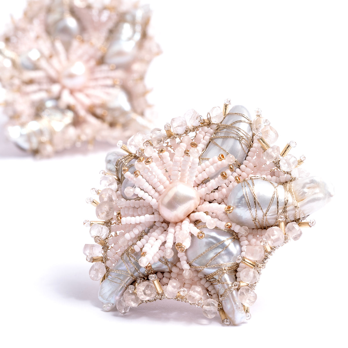 Detail of Deepa Gurnani handmade the Andrena earring in baby pink color