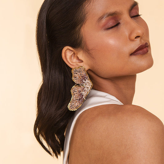 Model wearing Deepa Gurnani Handmade Lanelle Earrings in Beige color
