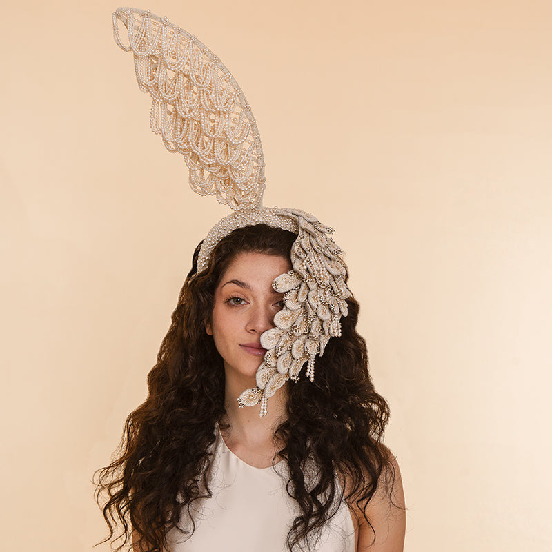 Model wearing Deepa Gurnani handmade the Raven headband in ivory color
