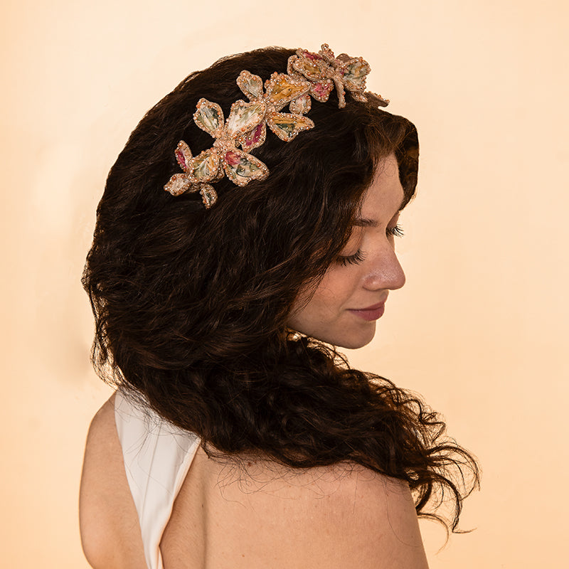 Model wearing Deepa Gurnani handmade the Apollo headband in Beige color