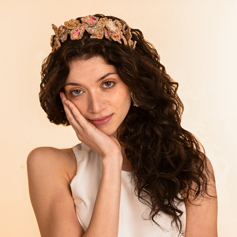 Model wearing Deepa Gurnani handmade the Apollo headband in Beige color