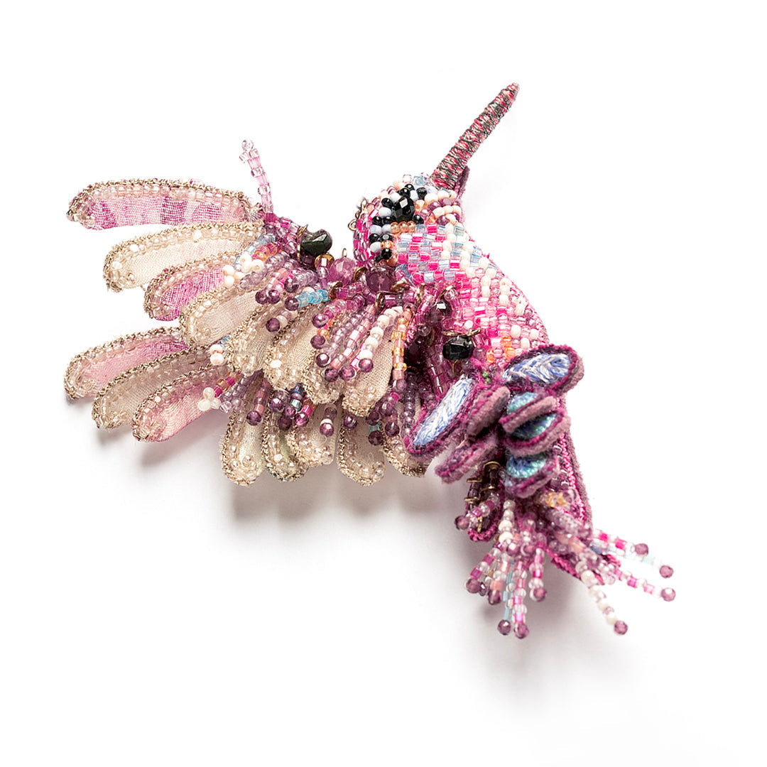 Detail of Deepa Gurnani handmade Hummingbird brooch in fuchsia color