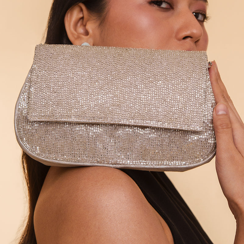 Model Wearing Deepa Gurnani Handmade Luann Clutch In Silver Color