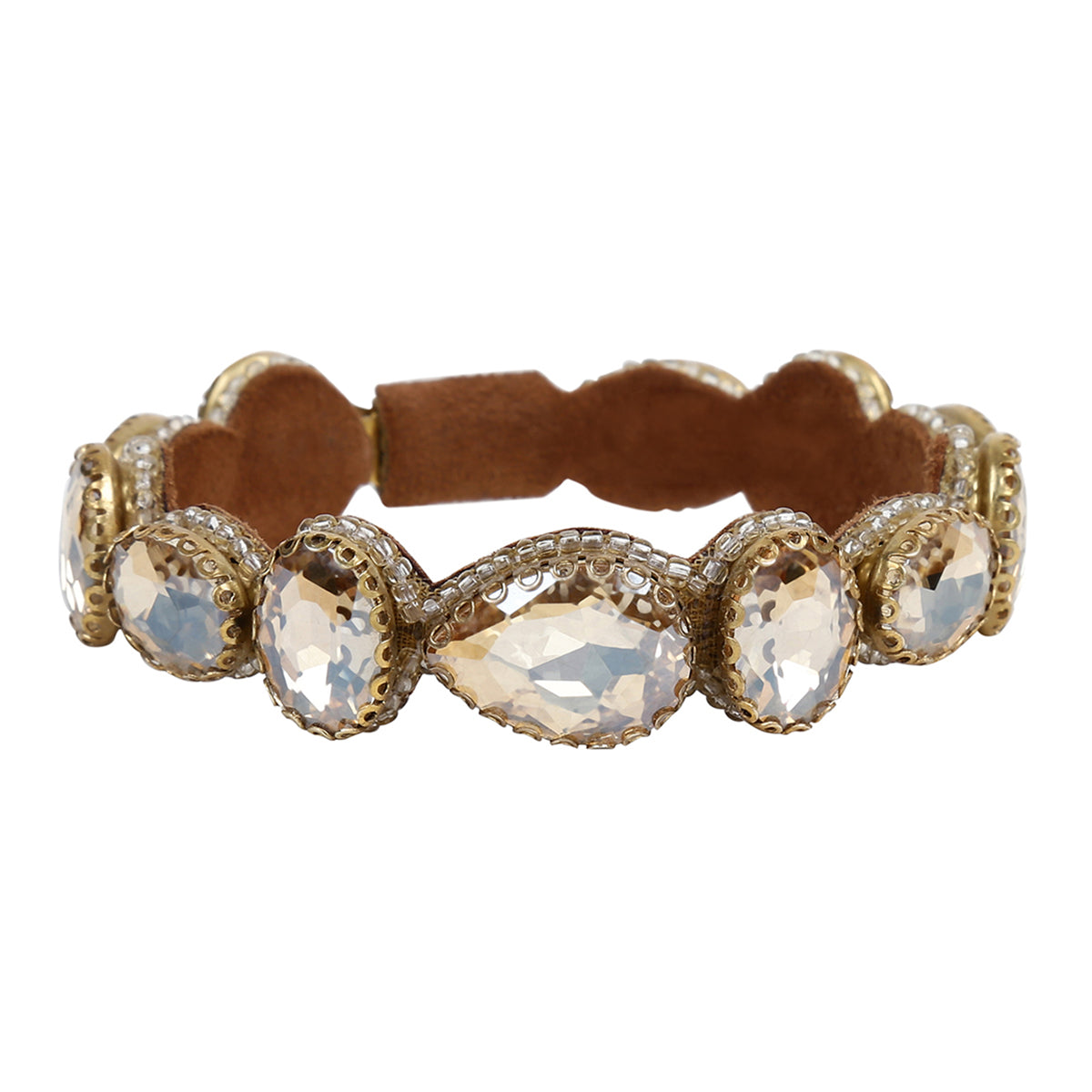 A gold-tone cuff bracelet featuring five large oval-cut clear crystals and a brown leather inner band, shown against a plain white background.