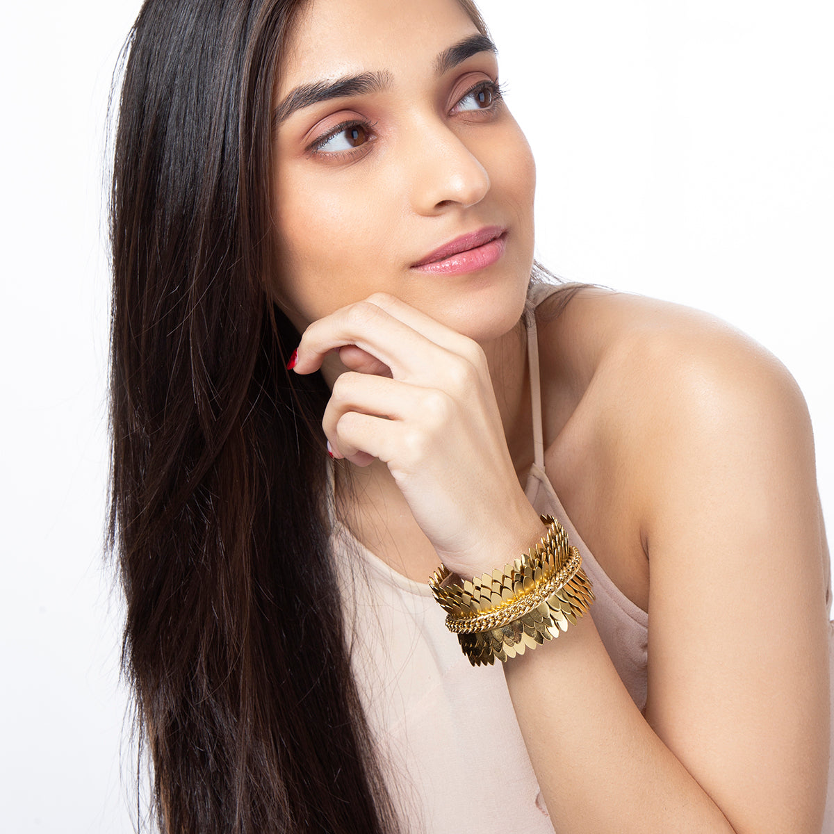 model wearing handmade gold cuff