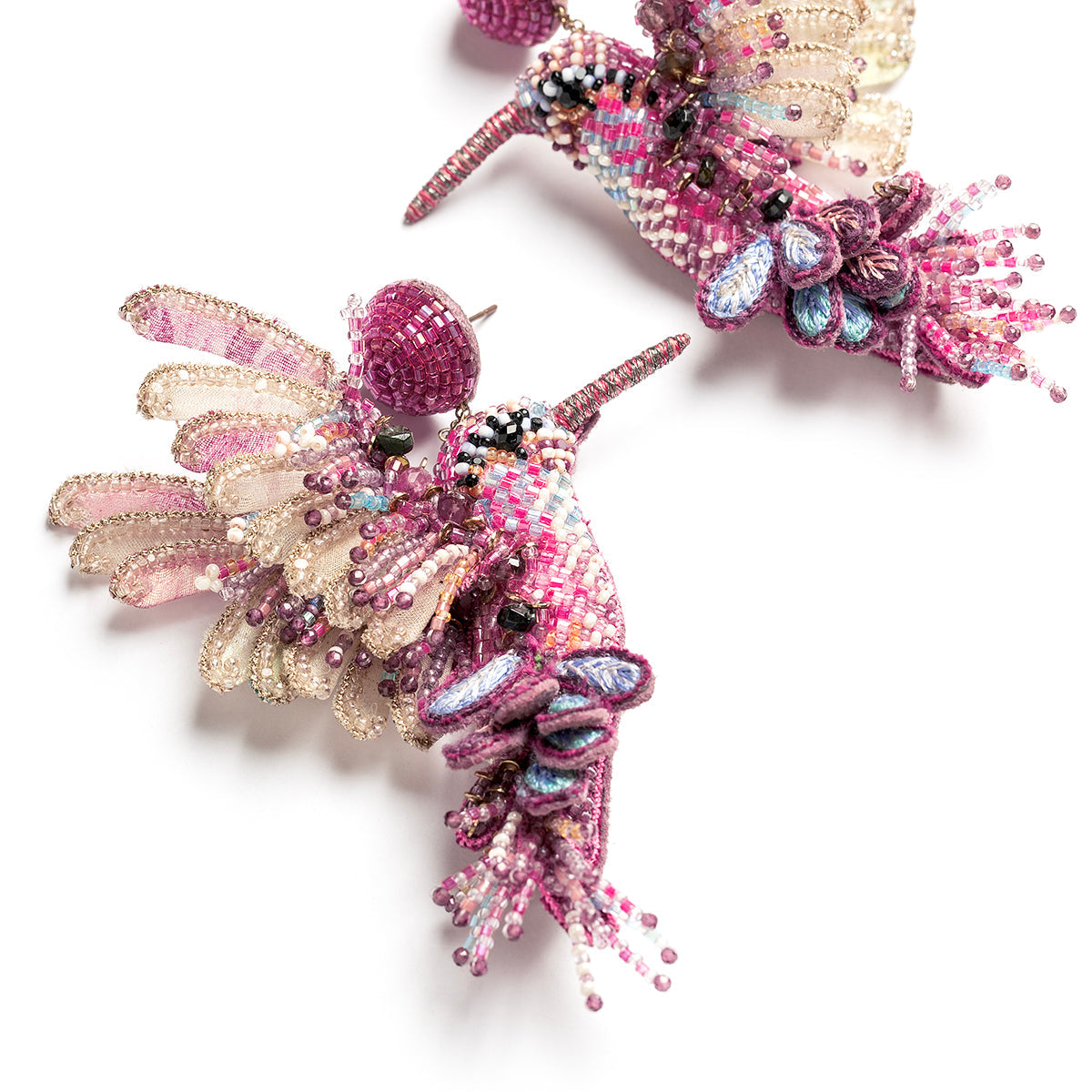 Detail of Deepa Gurnani handmade the Hummingbird earrings in fuchsia color