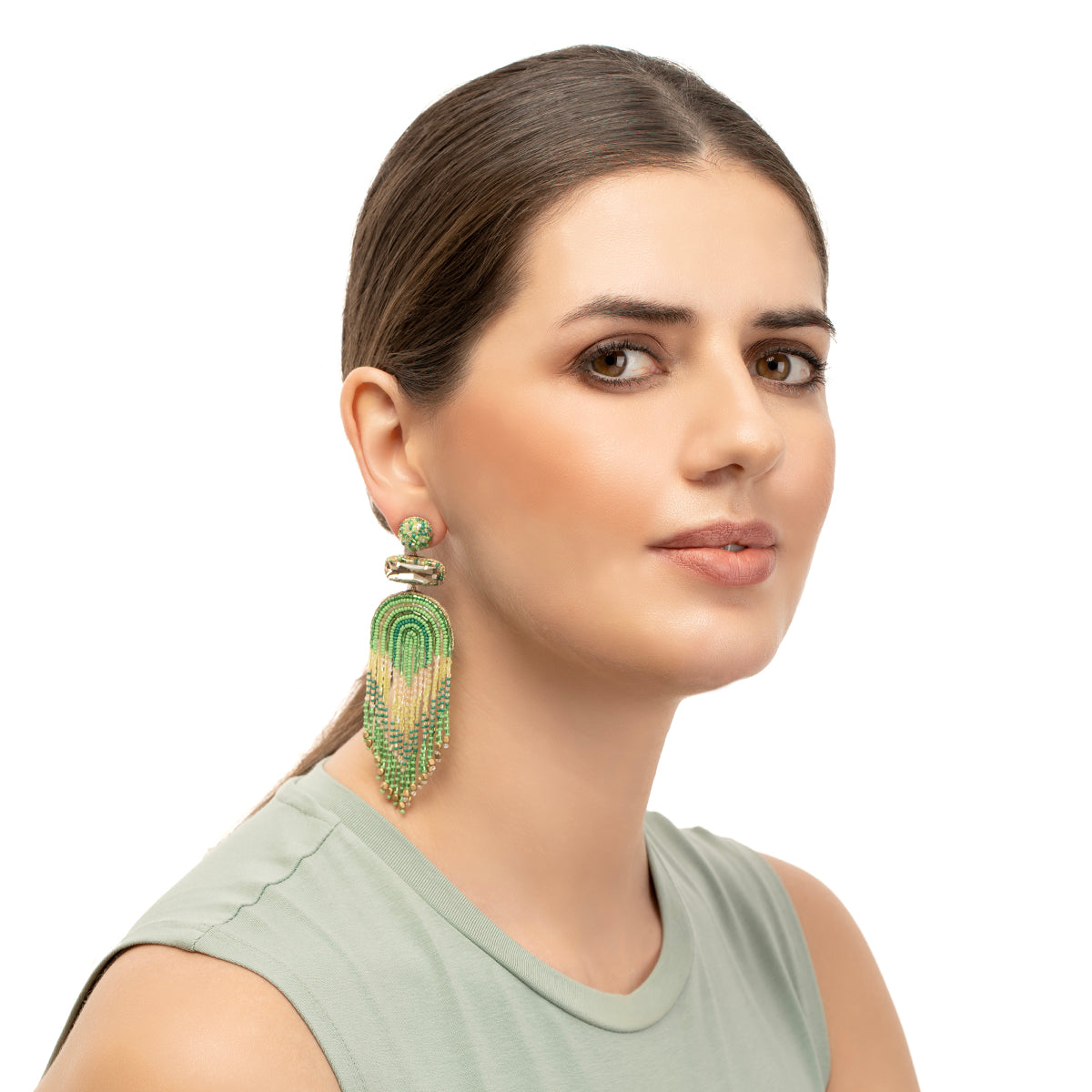 Model wearing our beautiful handmade Ishani earrings lime color