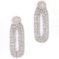 Our light weight Shyna Earrings are handmade with glass crystals in an oval drop shape silver color
