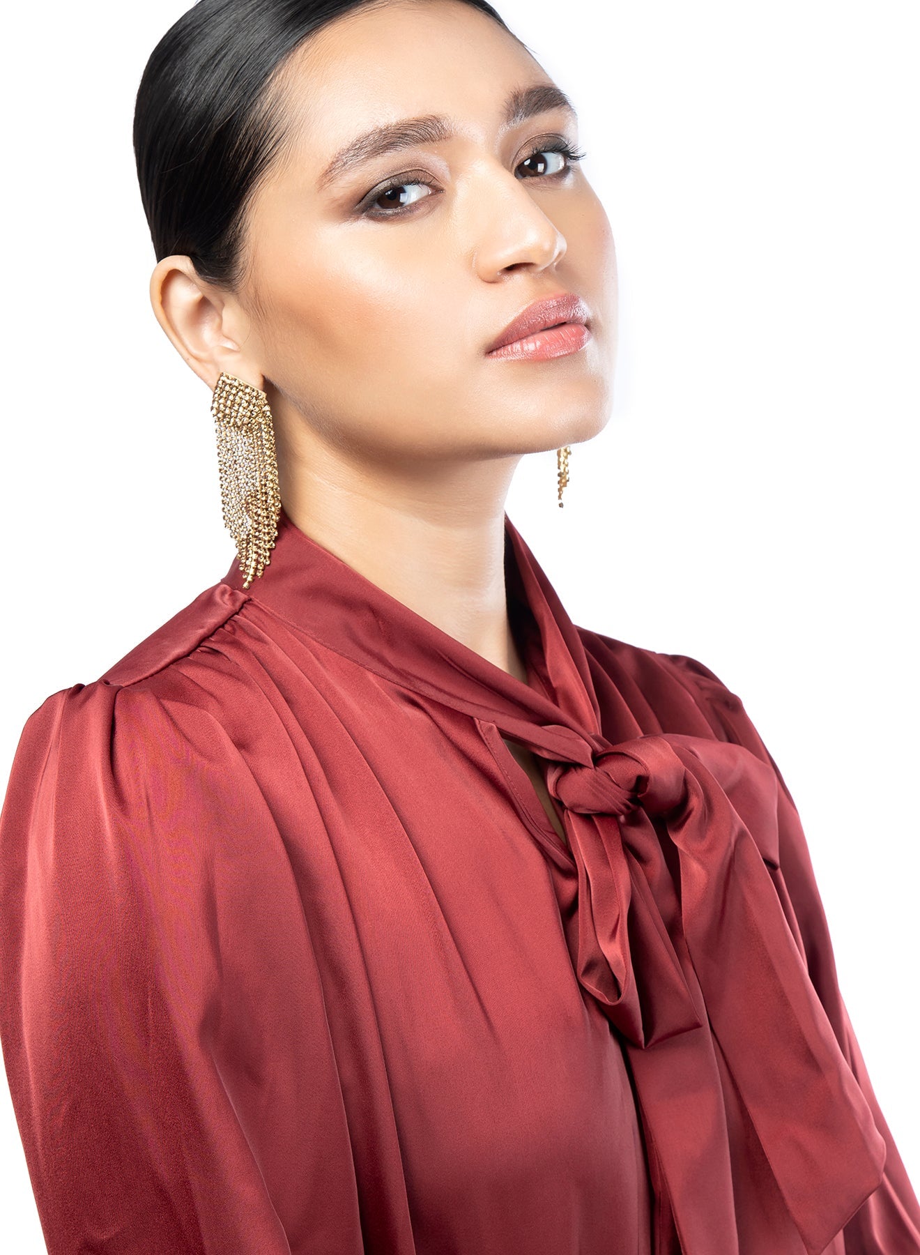 Model wearing Deepa By Deepa Gurnani handmade Niomi Earrings in gold color