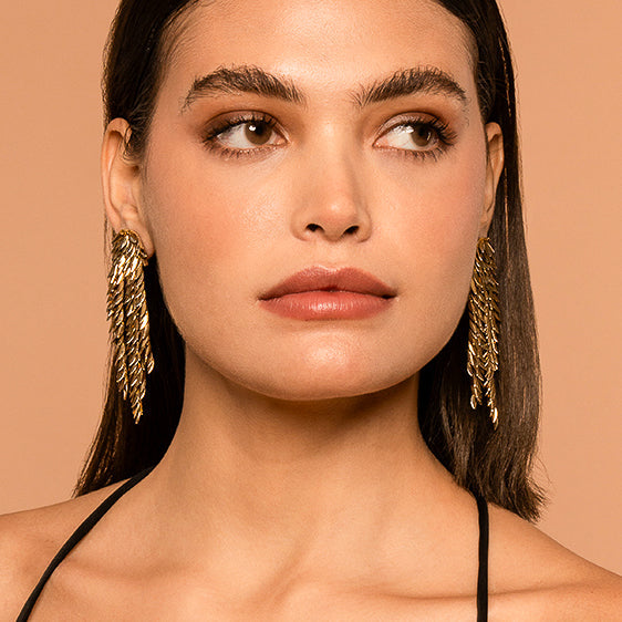 Model wearing Deepa by Deepa Gurnani Handmade Morrigan Earrings In Gold Color