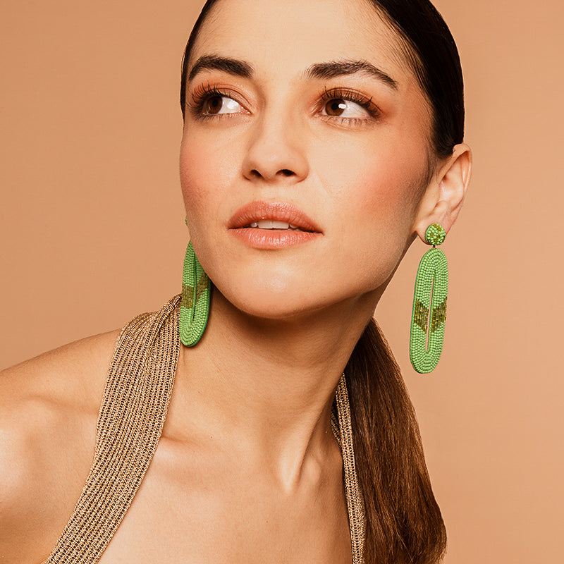 Model wearing our Deepa by Deepa Gurnani Handmade Olga Earrings in Green color