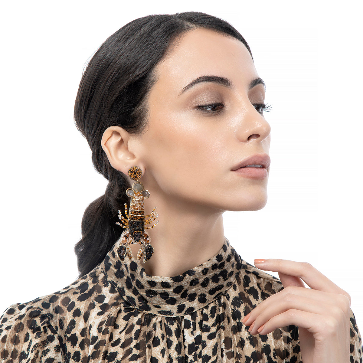 Handmade lobster post earrings worn by model