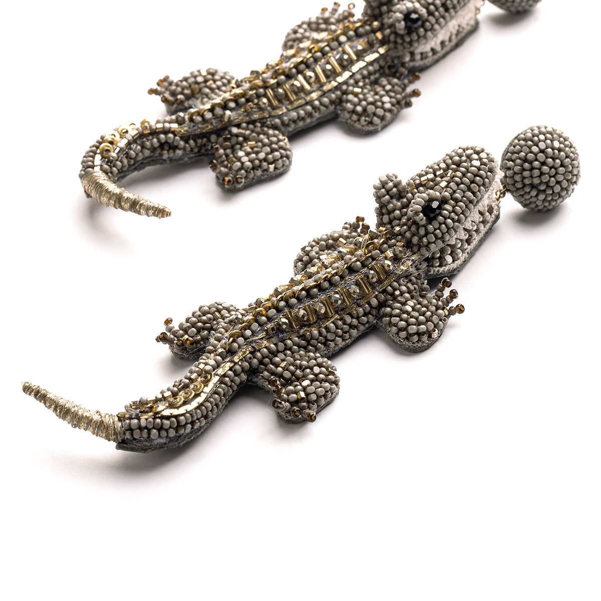 Detail of Deepa Gurnani handmade the Alligator earrings in olive color