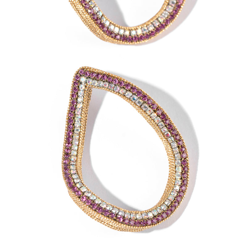 Detail of Deepa Gurnani handmade the Eve earring in fuchsia color