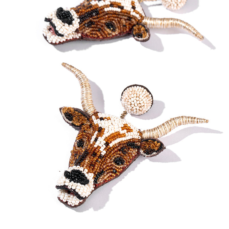 Detail of Deepa Gurnani handmade the Longhorn earring in Ivory color