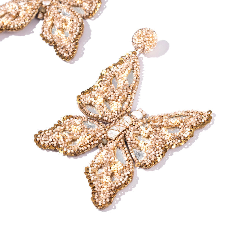 Detail of Deepa Gurnani Handmade Bruna Earrings in Beige color