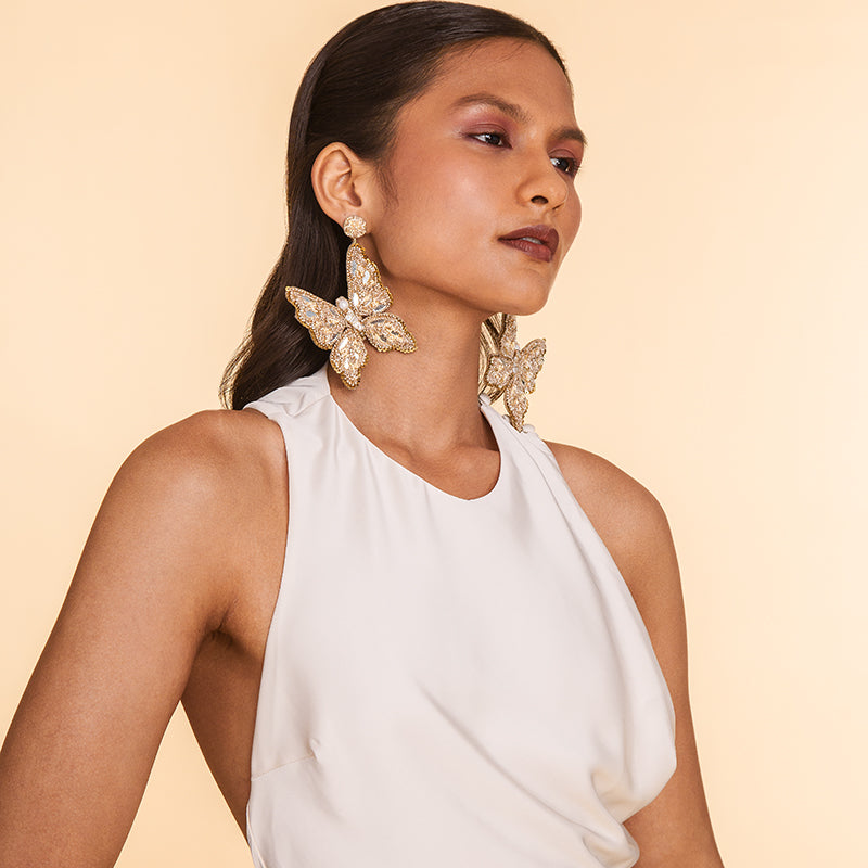 Model Wearing Deepa Gurnani Handmade Bruna Earrings in Beige color