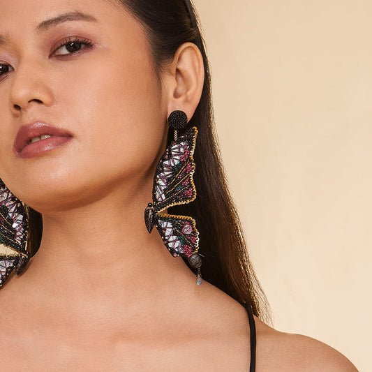 Detail of Model wearing Deepa Gurnani Handmade Arcadia Earrings in Black color