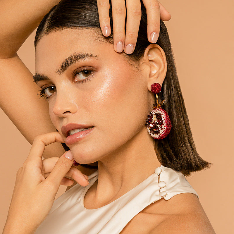 Model Wearing Deepa Gurnani handmade Pomegranate Earrings in Red color