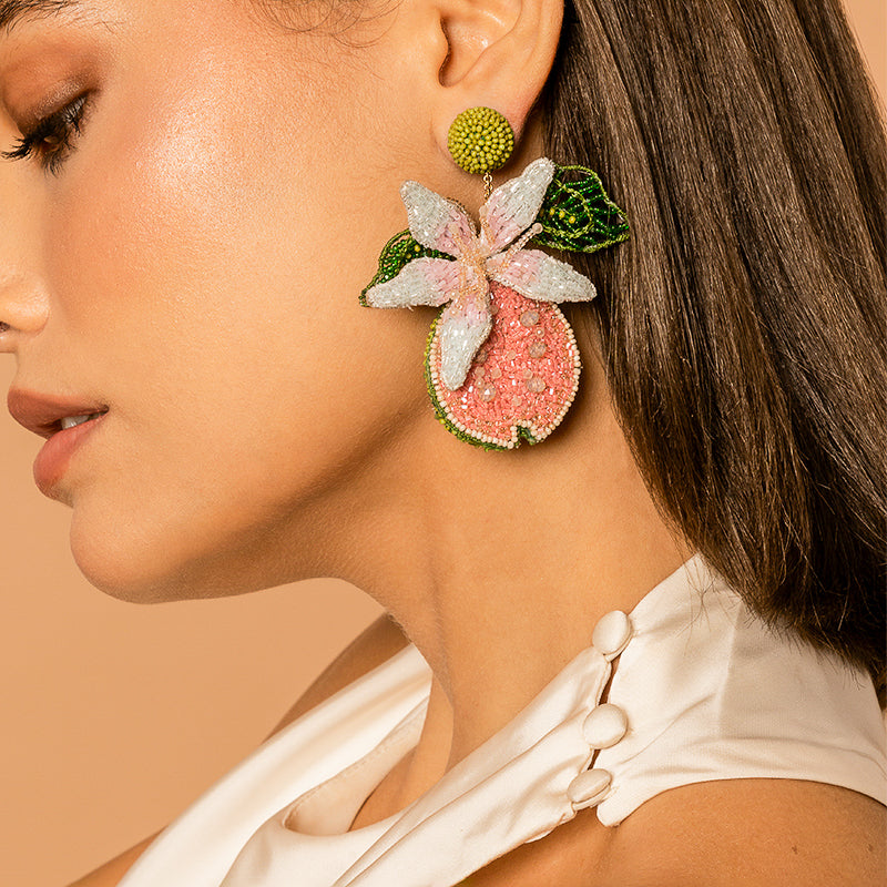 Model Wearing Deepa Gurnani handmade Guava Earrings in Pink color