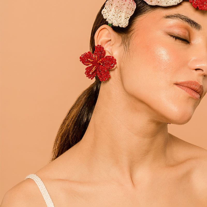 Model Wearing Deepa Gurnani handmade Hibiscus Earrings in Red color