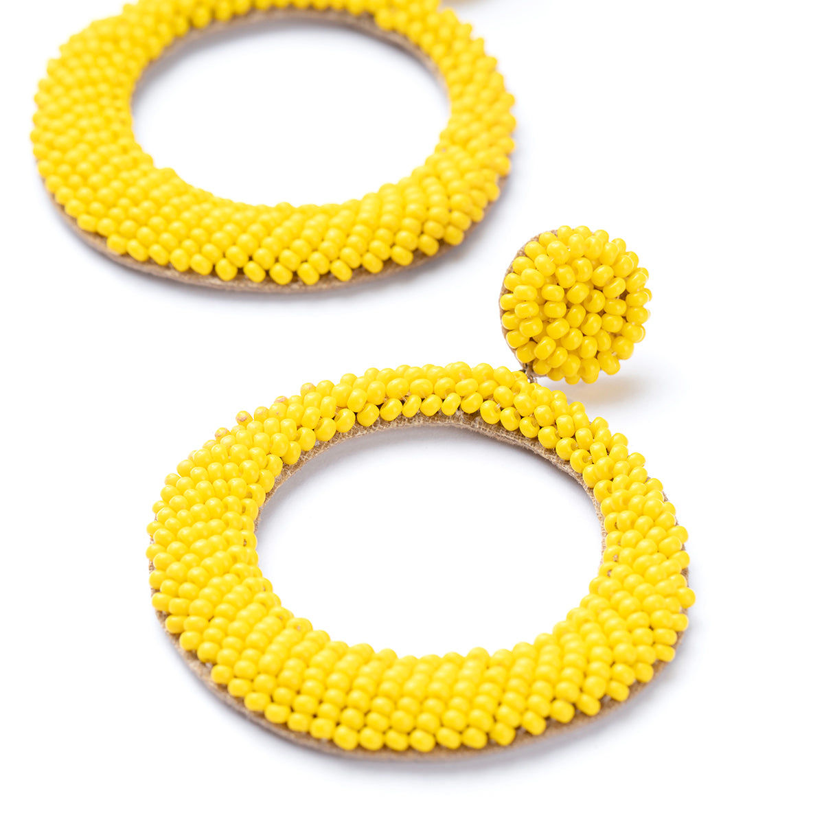 Close up of Asta Earrings in Yellow