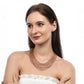 Model wearing Deepa by Deepa Gurnani Handmade Neelam necklace in champagne color