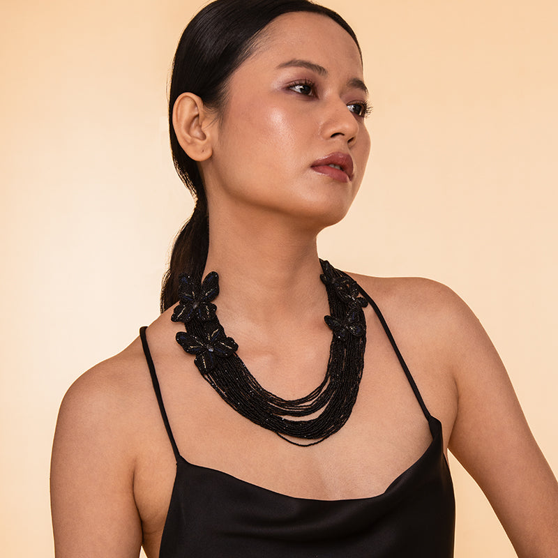 Model wearing Deepa Gurnani Handmade Black Atlas Necklace