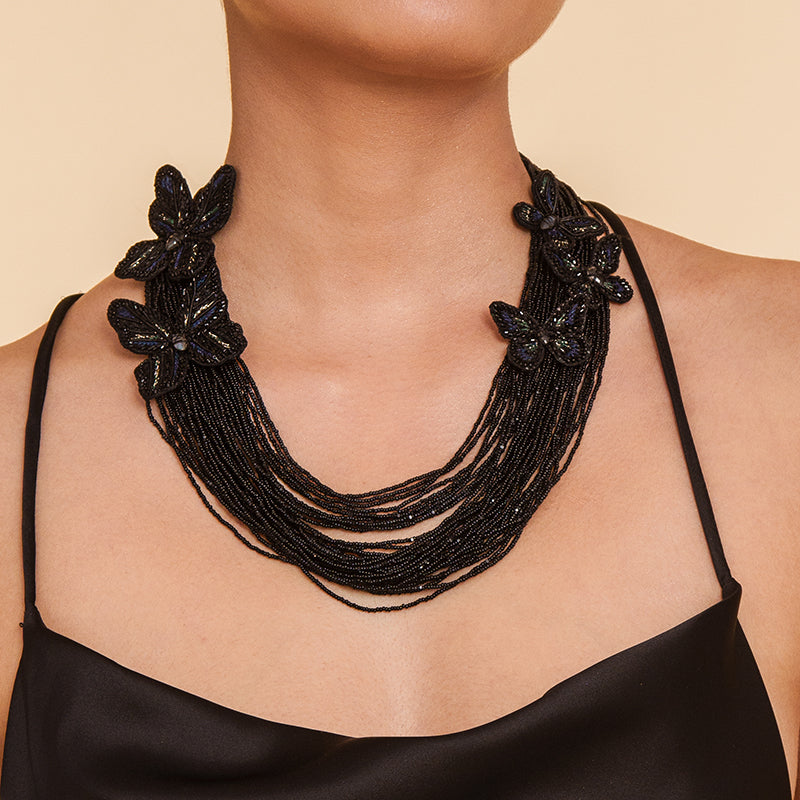 Model wearing Deepa Gurnani Handmade Black Atlas Necklace