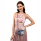 Model carrying Deepa Gurnani Hummingbird clutch in blue color