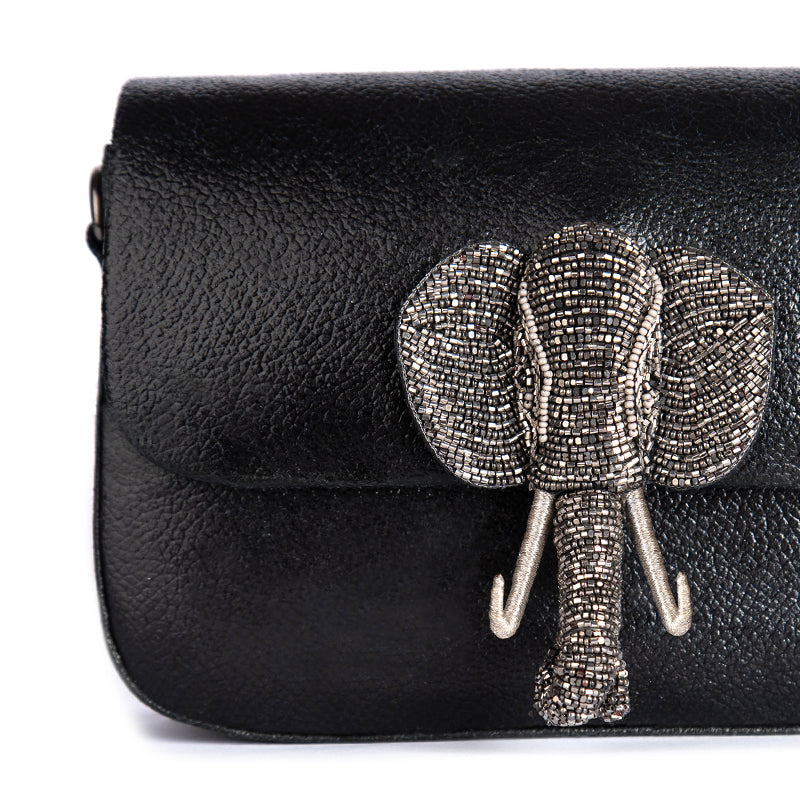 Detail Of Deepa Gurnani Handmade Elephant clutch in black color